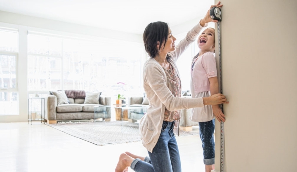 Mother measuring height